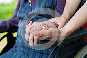 Holding hands - Parkinson disease