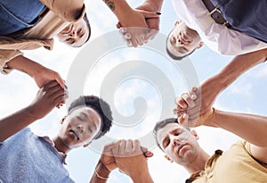 Holding hands, prayer circle and business people with support, faith and diversity in low angle by sky. Men, woman and