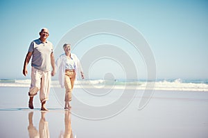 Holding hands, summer and an old couple walking on the beach with a blue sky mockup background. Love, romance or mock up