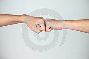 Holding hands of two men on a white background,Friends,Dear friend,Relationship