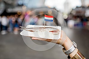 Holding herring with onions