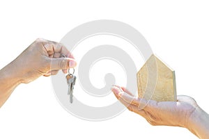 Holding house model and house key in hand.Mortgage loan approval home loan and insurance concept.on white background