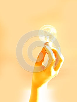 Holding a light bulb