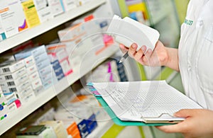 Holding medicine bottle and prescription chart