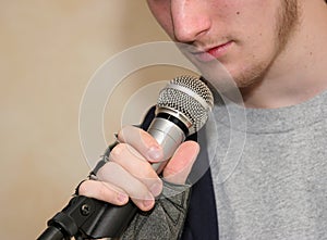 Holding Microphone