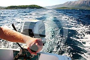 Holding motor on the boat