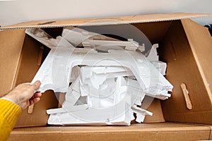 Holding multiple waste inside cardboard containing Polystyrene