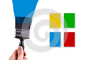 Holding Paint Brush