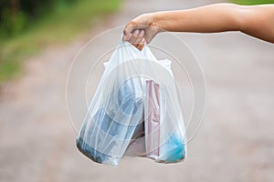 Holding Plastic Bags photo