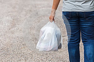 Holding Plastic Bags photo