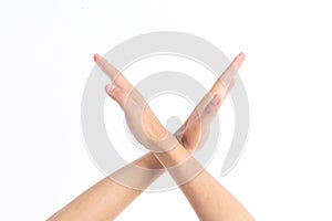 Holding a prohibited gesture in front of white background