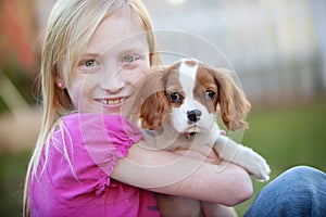 Holding puppy