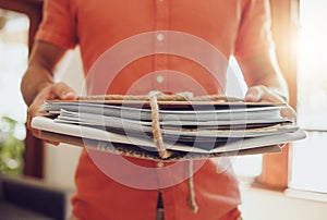 Holding recycle and paper stack closeup of hands inside environmentally friendly home. Sustainable, waste management and