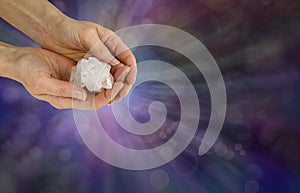 Holding a Reiki Master Apophyllite Crystal Cluster