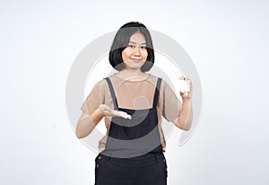 Holding and Showing Blank Credit Card Of Beautiful Asian Woman Isolated On White Background