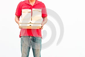 Holding various take-out food containers, pizza box, in holder and paper bag, close-up. photo