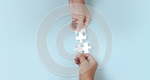 Holds in hand  jigsaw puzzle. Business solutions success