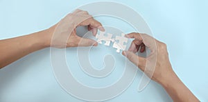 Holds in hand  jigsaw puzzle. Business solutions success