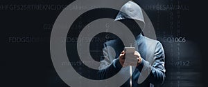 Holds the phone on a dark background. hacker concept