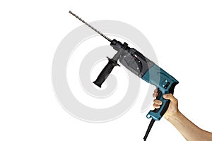 Holds the professional rotary hammer with a drill on white background. drill hammer in hand on a white background