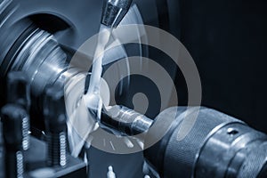 The hole drilling process on turning machine with liquid coolant method