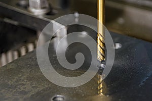 The hole finishing process on CNC milling machine with reamer tool tools photo