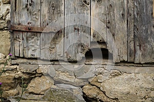 Hole in old barn door