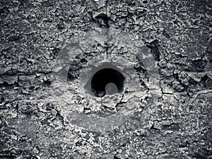 Hole in old masonry