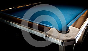 Hole of pool table in dark room for game