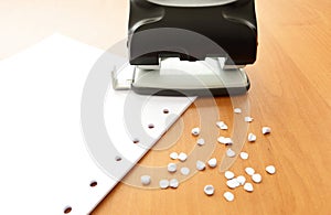 Hole puncher with paper and confetti