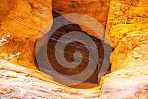 Hole in red rocks of Zion National Park