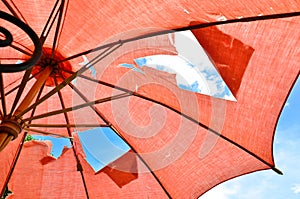 The hole on Red umbrella