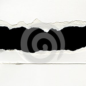 Hole ripped in white paper with black space for your message