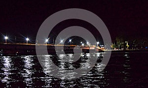 The Hole River Ganga - Ganges - at a Bathing Ghat in Haridwar at Night with Reflections of Light in Water - Uttarakhand, India