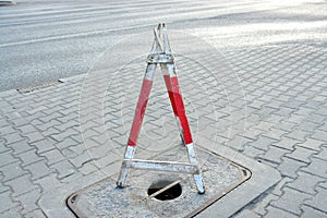 Hole in sidewalk