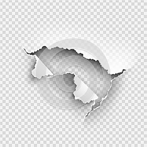 Hole torn in ripped paper on transparent