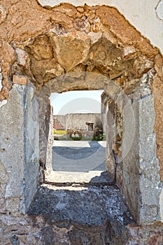 Hole on the wall of an abandoned industrial building