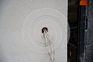 hole in the wall for the doorbell