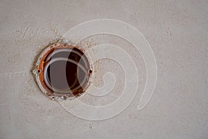 Hole in wall for an electricity socket