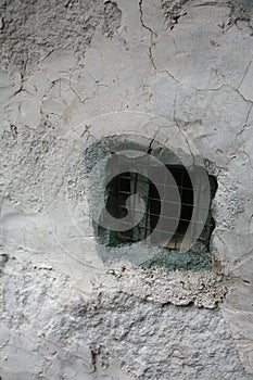Hole in the wall exposing wires photo