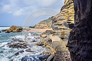Hole in the wall natural rock formation at Thompsons bay beach ballito
