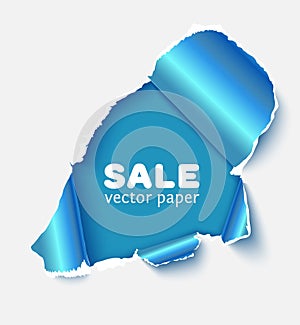 Hole in white paper with blue torn sides