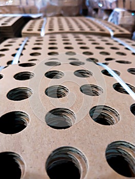 Holes in layer carton box in industri