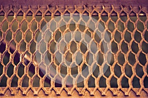 Holey metallic lattice texture. background