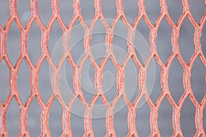 Holey metallic lattice texture. background