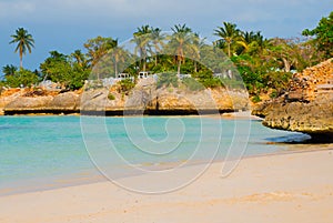 Holguin, Guardalavaca Beach, Cuba: Caribbean sea with beautiful blue-turquoise water and gentle sand and palm trees. Paradise land