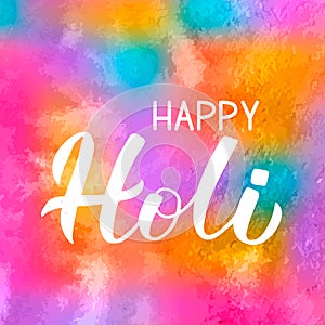 Holi calligraphy hand lettering on colorful watercolor background. Indian Traditional festival of colors. Hindu spring celebration