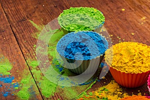 Holi color powder. Organic Gulal colours in bowl for Holi festival, Hindu tradition festive. Bright vibrant pigment