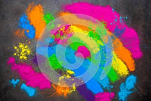 Holi colored powders background. Holi traditional festival. View from above