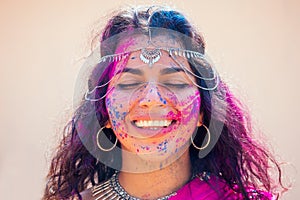 Holi Festival Of Colours. Portrait of happy indian girl in traditional hindu sari on holi color . india woman silver